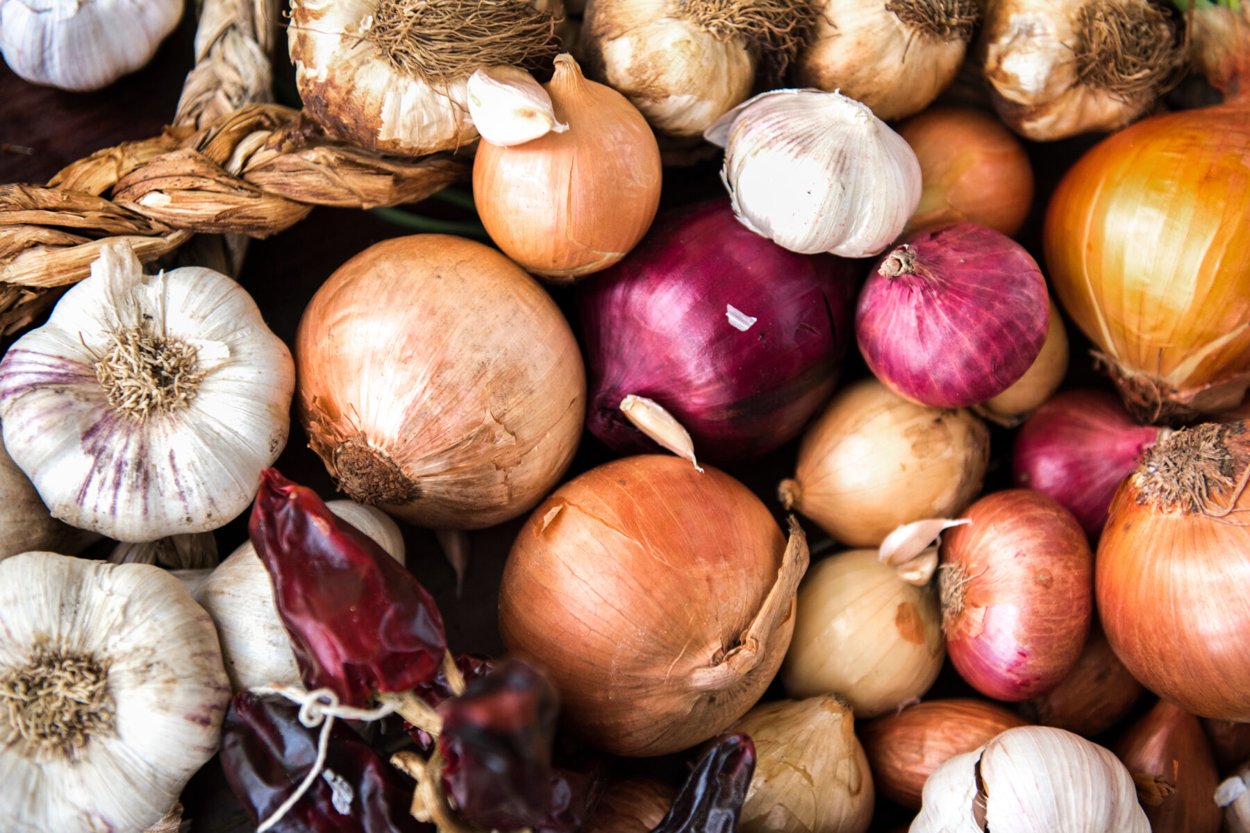 The best way to store garlic and onions (and make sure they don’t sprout)