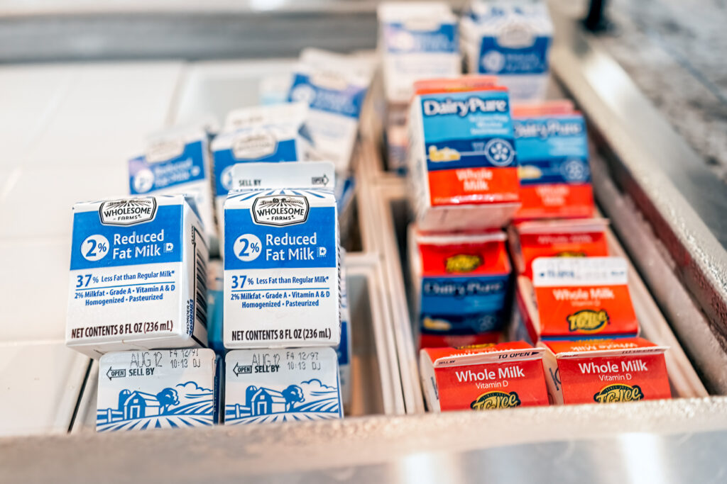 Small cartons of milk